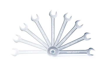 Wrench (spanner) move on white background