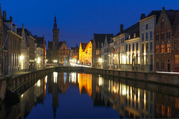 Fototapeta na wymiar Scenic night cityscape with views of Spiegelrei and Jan van Eyckplein in Bruges, Belgium