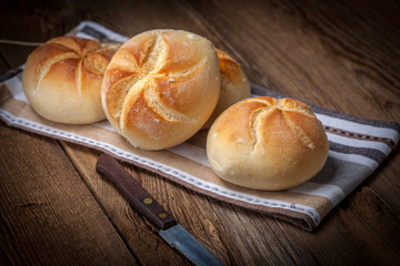 Several kaiser rolls.