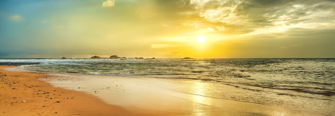 Fototapety  Sunset over the sea. Panorama