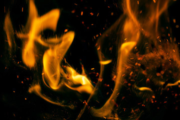 fire flames with sparks on a black background