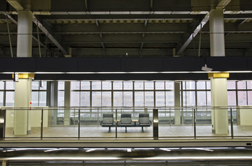 Wait chair on the train station platform.