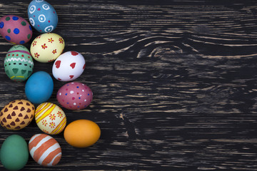 Easter eggs on wooden background.