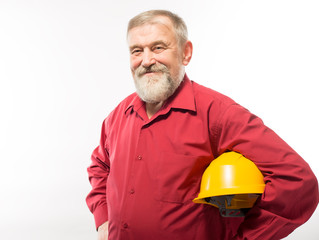 man holding his helmet in his hands