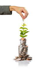 hand putting a coin in jar, saving money