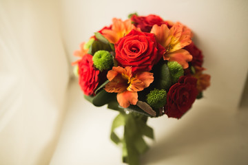 Beautiful luxury wedding bouquet of red flowers