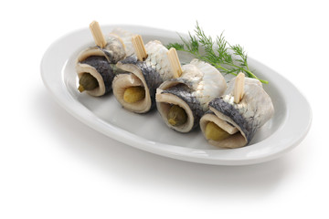 homemade rollmops, rolled pickled herring fillets