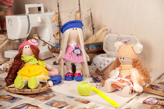 handmade dolls in workplace