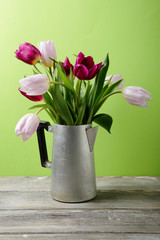 tulips in vintage coffee pot
