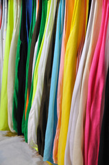 Multicolor cloth arrange in cloth line.