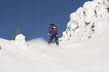 Fototapeta na wymiar snowboarder in mountain terrain