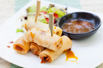 Spring rolls with vegetables, sweet mango chili sauce. Asian cuisine