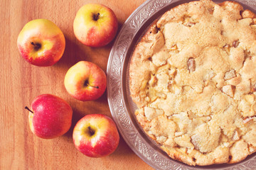 Homemade pie with apples on the table