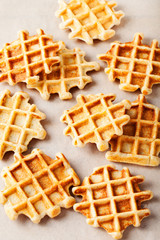 Wholegrain belgian waffles on paper background