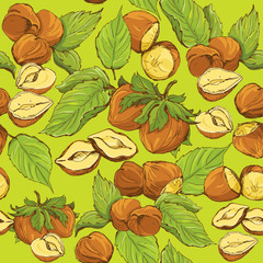 Seamless pattern with highly detailed hand drawn hazelnuts on gr