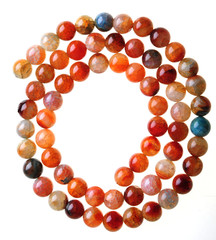 natural beads strands on white isolate