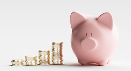 Salvadanaio porcellino rosa con monete © Aldeca Productions