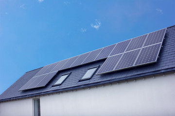 Solar Panels On House Roof. Sustainable Renewable Energy