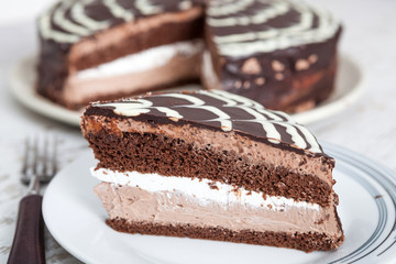Delicious chocolate cake with chocolate sauce