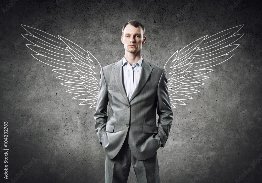 Wall mural Businessman with wings