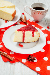 
pastries, desserts , curd pudding with milk,cottage cheese casserole , cinnamon and red strawberry or cherry jam on a wooden background