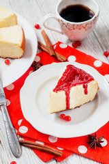 
pastries, desserts , curd pudding with milk,cottage cheese casserole , cinnamon and red strawberry or cherry jam on a wooden background