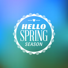 Spring Vintage Typographic Badge on Colorful Blurred Background. Spring Vector Illustration. Hello Spring. Greeting Card Design