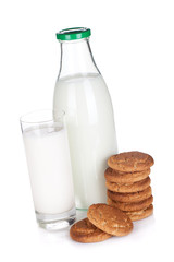 Glass, bottle of milk and cookies