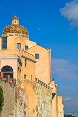 Fototapeta premium View of city walls and Santa Maria Cathedral at Castello downtown area, Cagliari, Sardinia, Italy