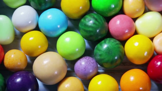 Multi-colored sweets, lollipops and chewing gum. dolly shot