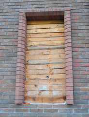 Boarded up Home Window Frame under Construction