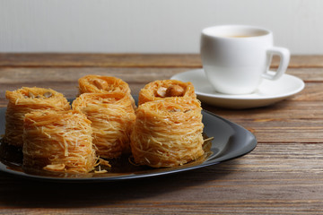 Eastern sweets and cup of coffee