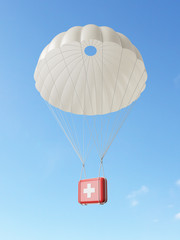 Parachute with first aid kid. Isolated over white background