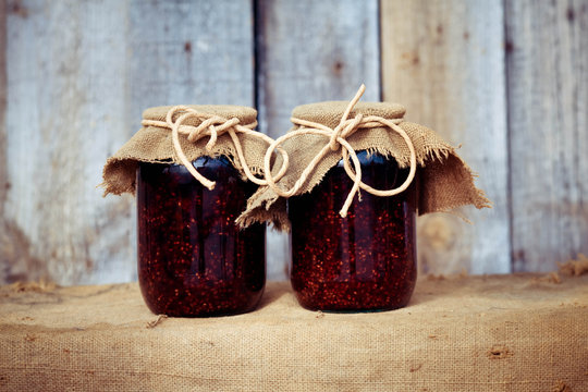 Fresh raspberry jam in a glass jar