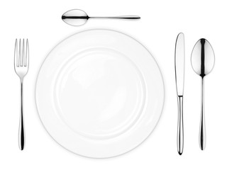 place setting with dish knife fork and spoons isolated on white background