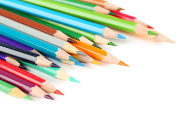 Drawing colourful pencils on a white background, close up