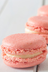 Close up of Pink Macarons on Table Vertical