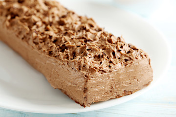 Chocolate cake on a blue wooden background