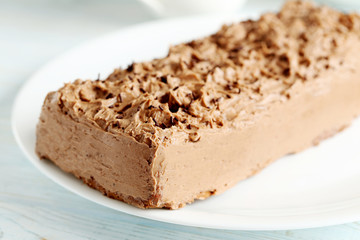 Chocolate cake on a blue wooden background