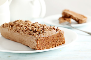 Chocolate cake on a blue wooden background