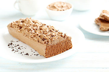 Chocolate cake on a blue wooden background