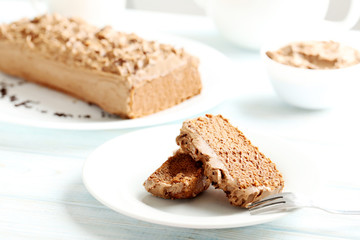 Chocolate cake on a blue wooden background