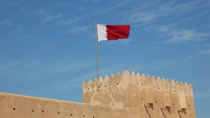 National flag of Qatar at the tower of Al Zubara fort, Middle East