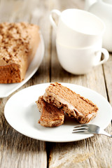 Chocolate cake on a grey wooden background