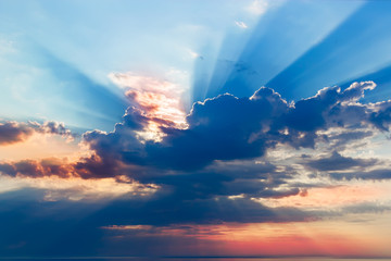 Obraz na płótnie Canvas Beautiful sunset, light majestic clouds.
