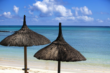 Sun protection umbrellas, beach, sea.