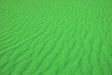 perfect texture green waves of sand. top view