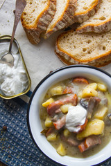 Polish sour soup with sausage.