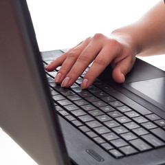Fototapeta na wymiar Woman's hands on computer