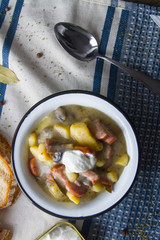 Polish sour soup with sausage.